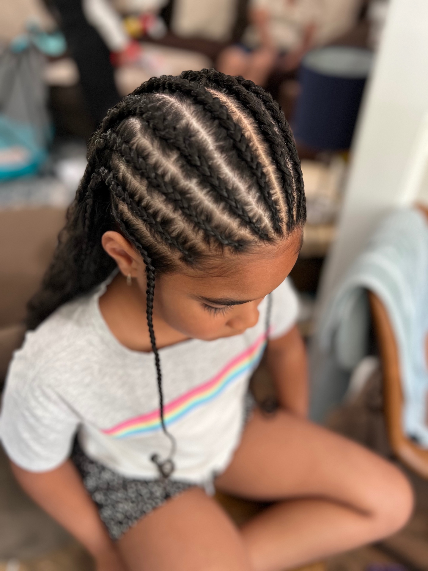 Feed-in braids with ponytail for a young client